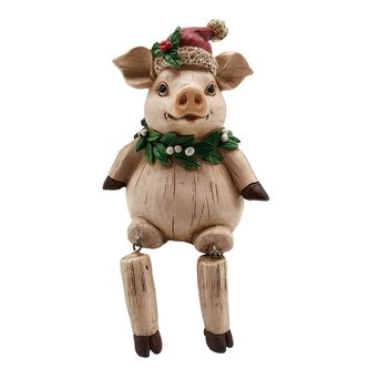 Sedící prasátko ve vánoční čepici