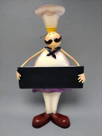 Kuchař s tabulí plech