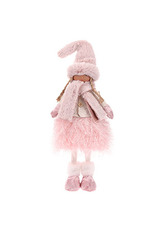 Děvčátko v růžovém kabátě a sukni, stojící.