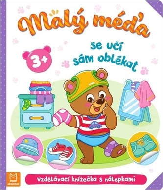 Malý méďa se učí sám oblékat