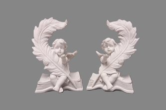 Anděl na knize s diamantem