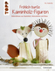 Fröhlich-bunte Kaminholz-Figuren